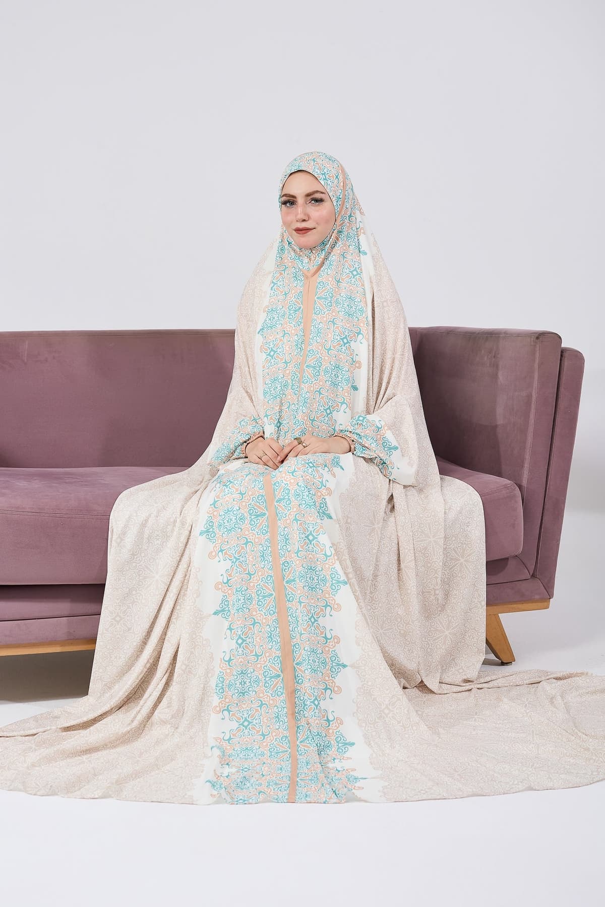 Prayer pose in satin floral gown for home
