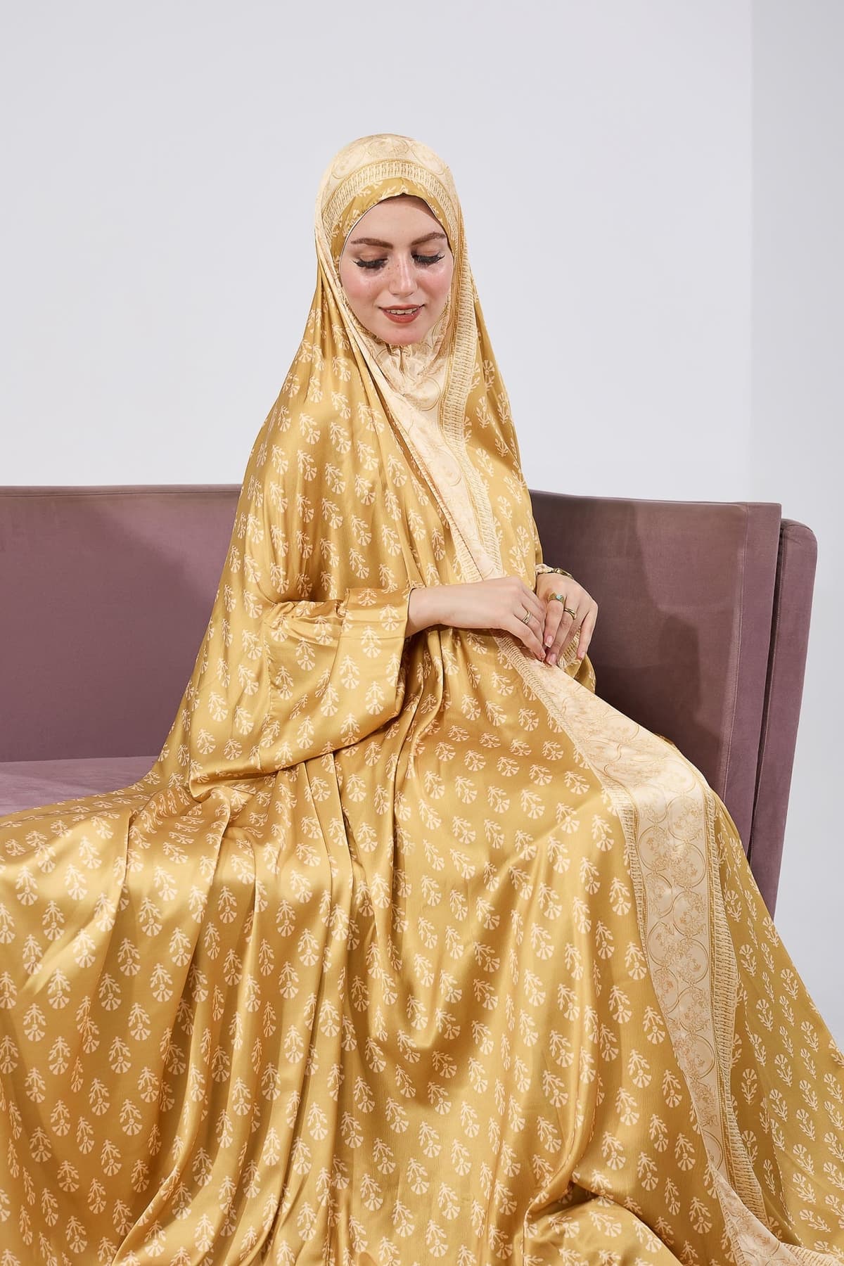Full-length golden satin prayer gown in floral print