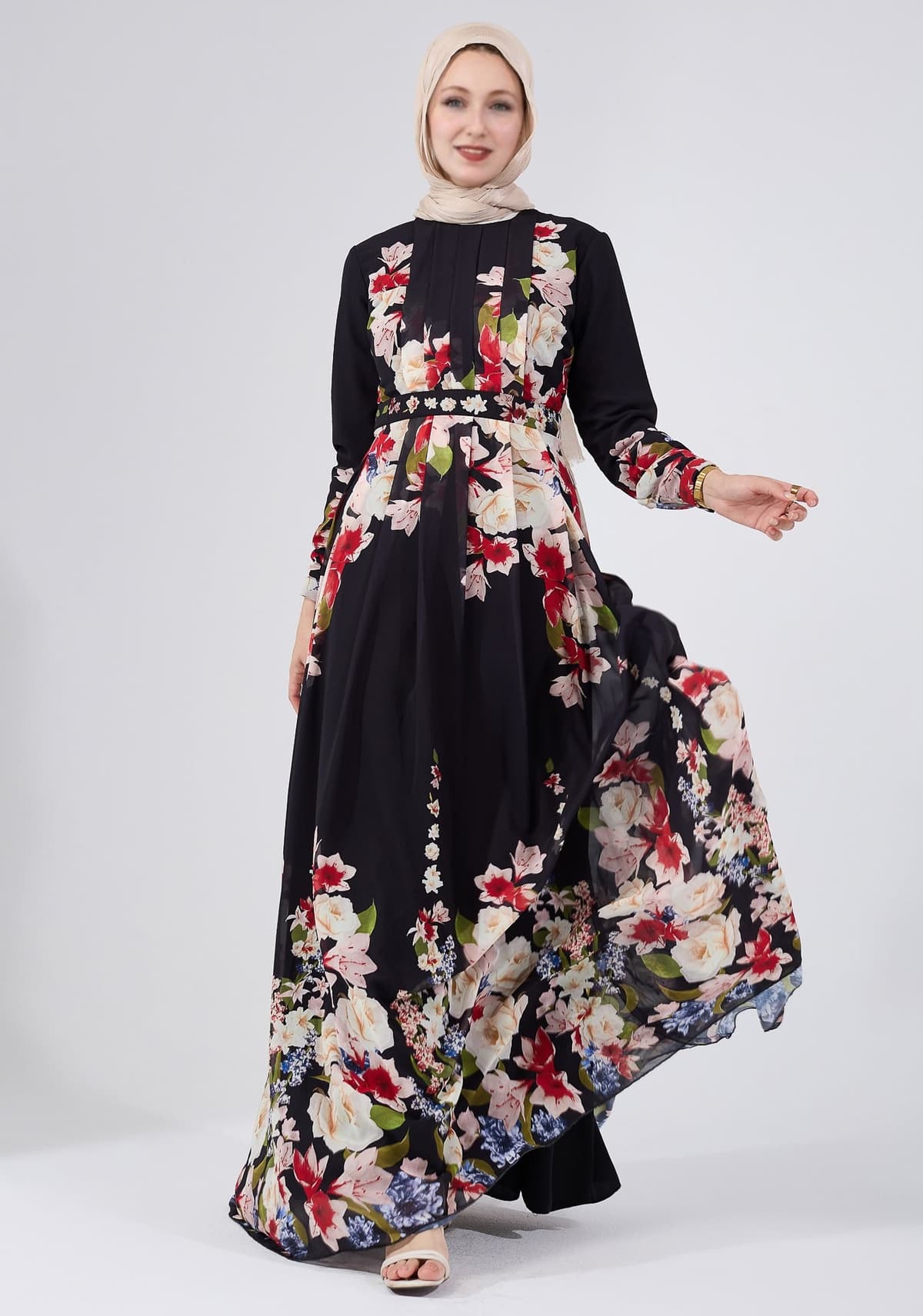 Close-up of floral detail on chiffon maxi dress bodice