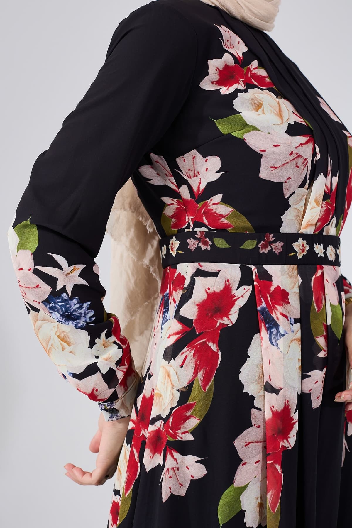 Pleated design on bodice of chiffon maxi dress with floral pattern