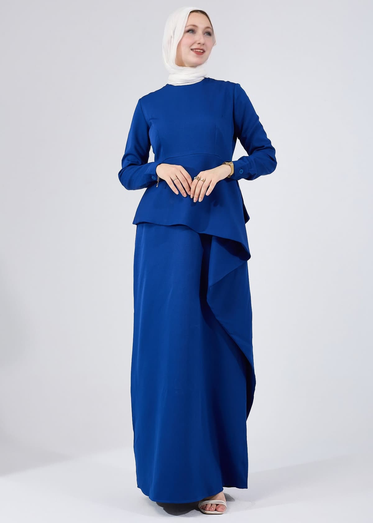 Hem detail of Asymmetric Peplum Maxi Dress in Royal Blue