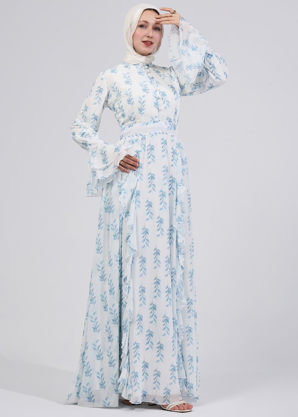 Detailed shot of bell sleeves on chiffon floral dress