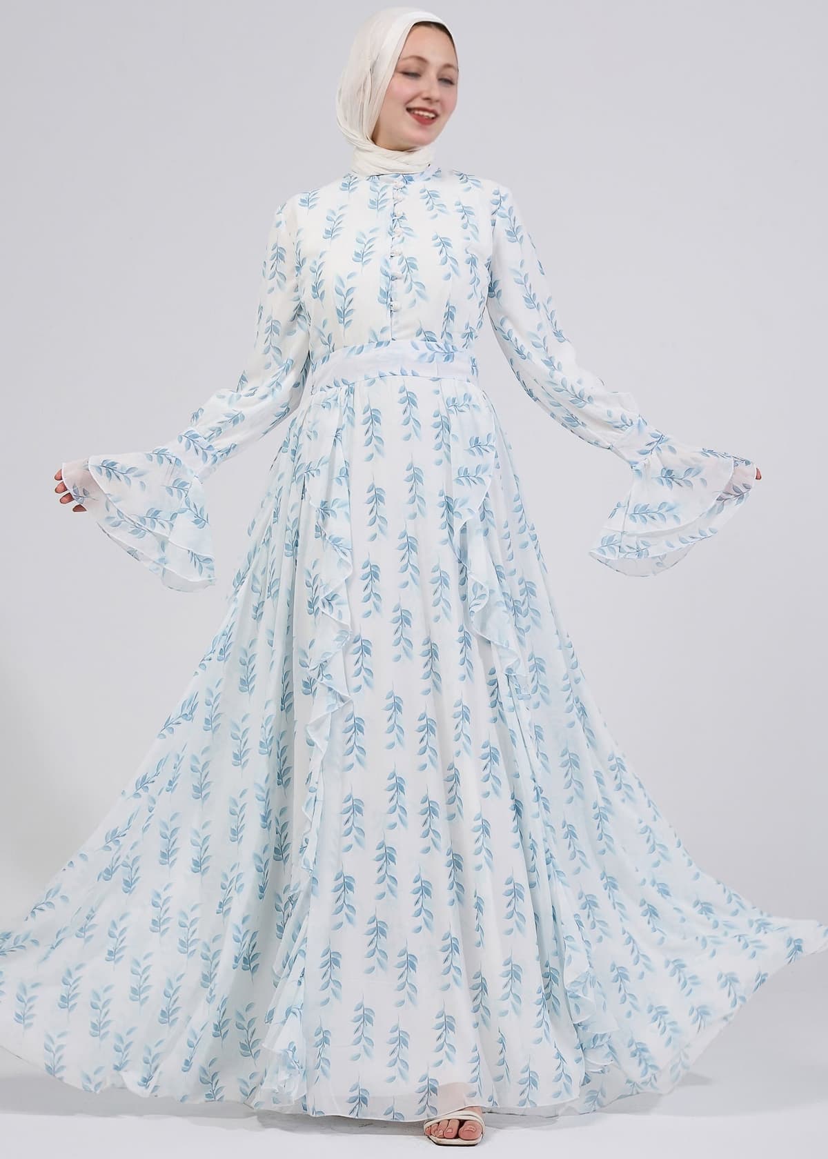 Model showcasing the elegance of the floral chiffon maxi dress