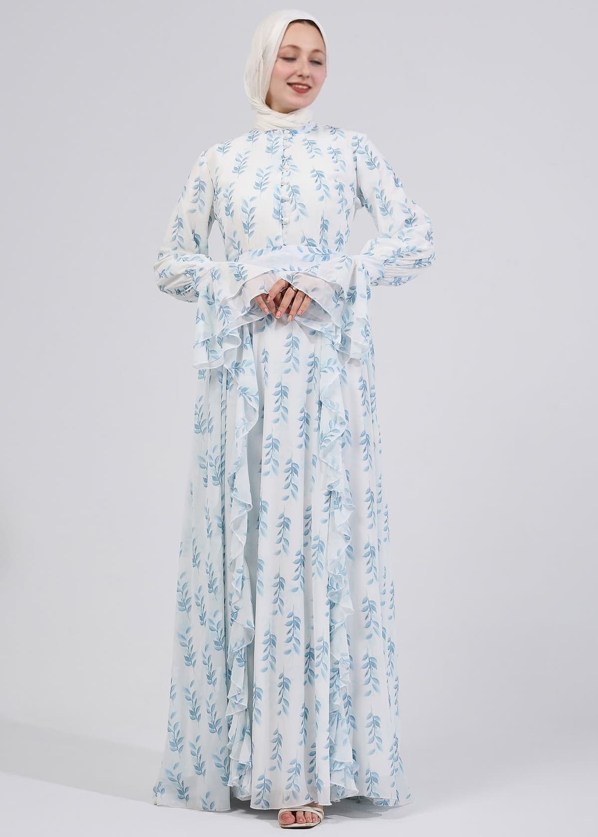 Closeup of ruffle detail on floral elegance chiffon maxi dress