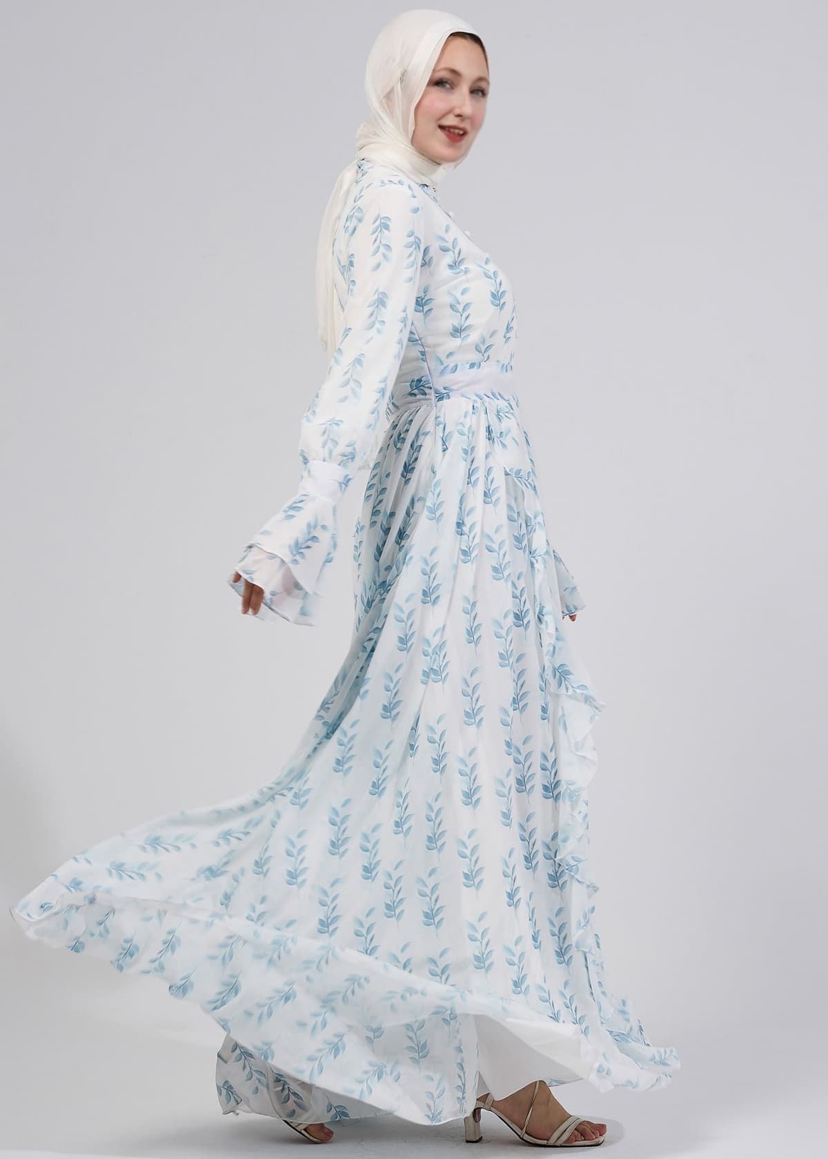 Elegant white chiffon maxi dress with blue floral print and ruffles