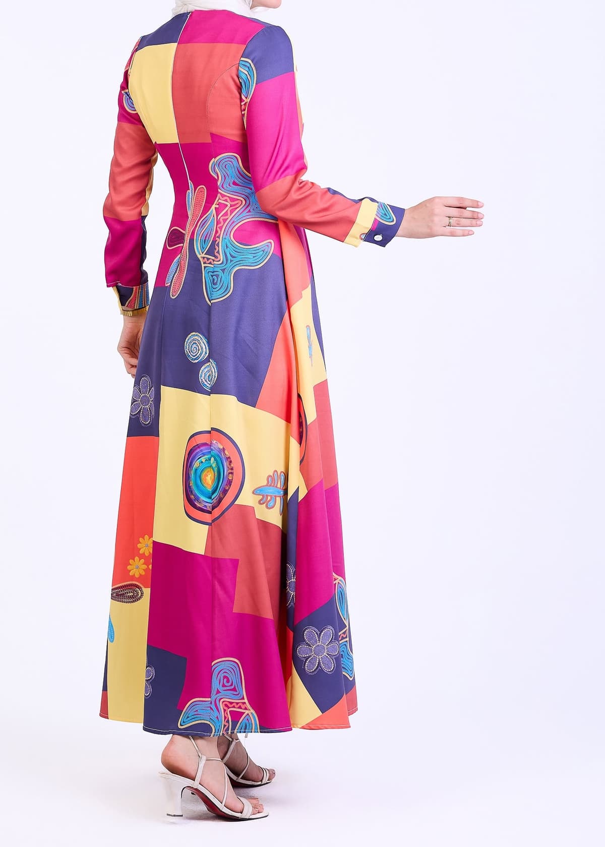 Model wearing vibrant patchwork crepe maxi dress