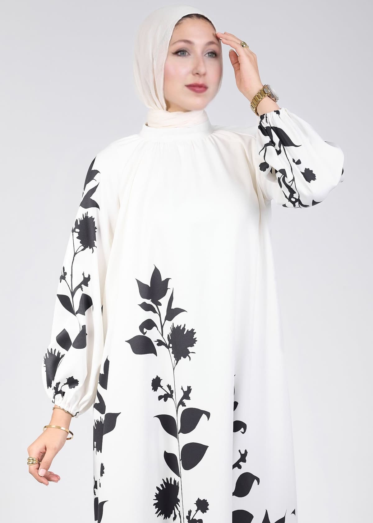 Fabric detail of durable crepe polyester on floral printed maxi dress