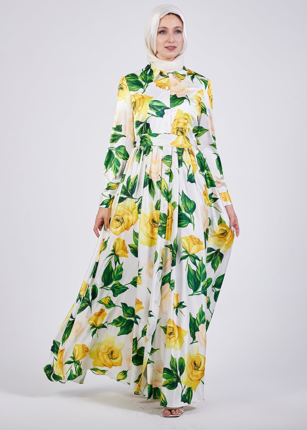 Detailed view of the floral print on the satin maxi dress