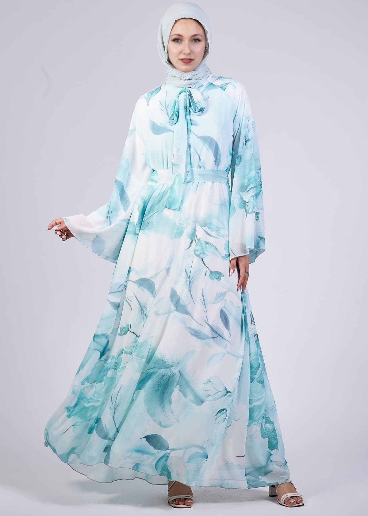 Twirling in the Elegance Floral Maxi Dress showing its flowing silhouette