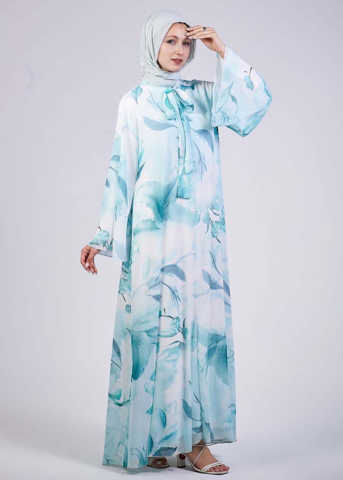 Full sweep view of the Elegance Floral Maxi Dress in motion