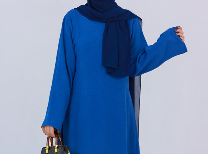 Blue Kira loose slip dress with pockets in maxi length and with long sleeve