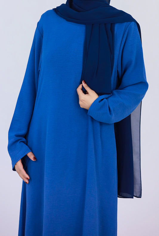 Blue Kira loose slip dress with pockets in maxi length and with long sleeve