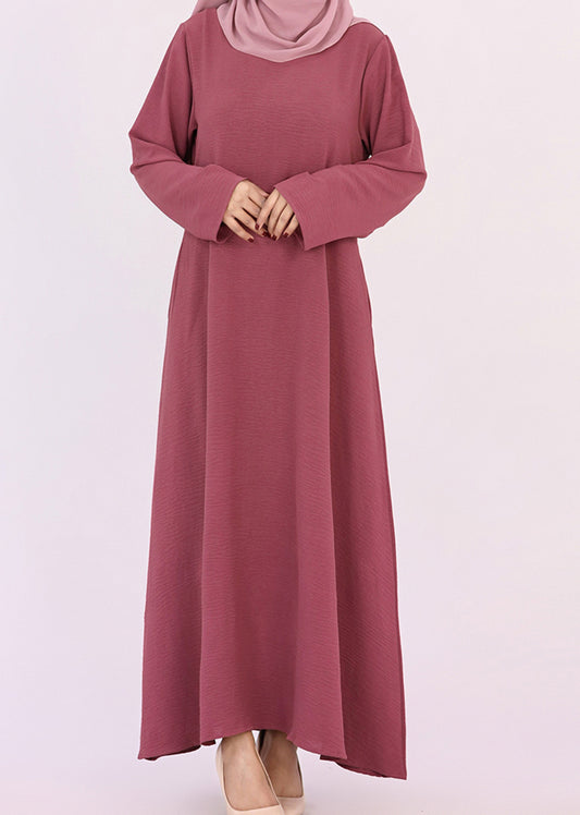 Dark Pink Kira loose slip dress with pockets in maxi length and with long sleeve