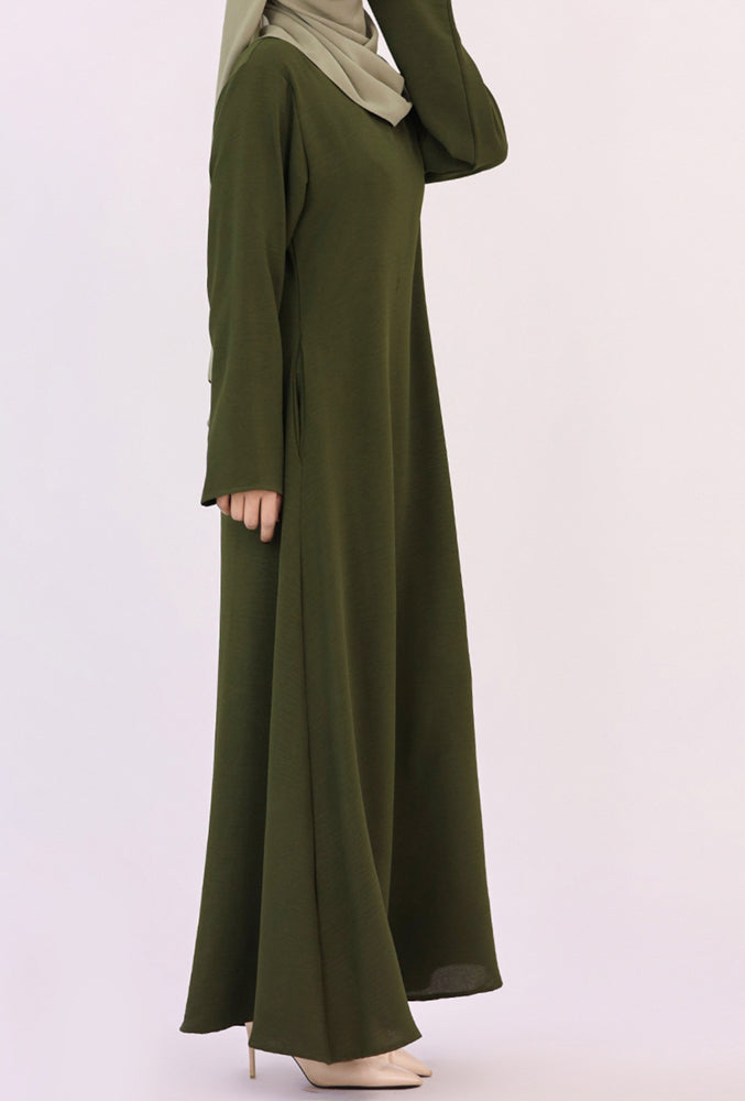Army Green Kira loose slip dress with pockets in maxi length and with long sleeve