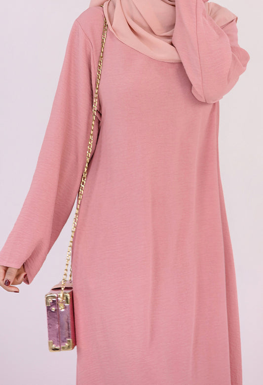 Pink Kira loose slip dress with pockets in maxi length and with long sleeve