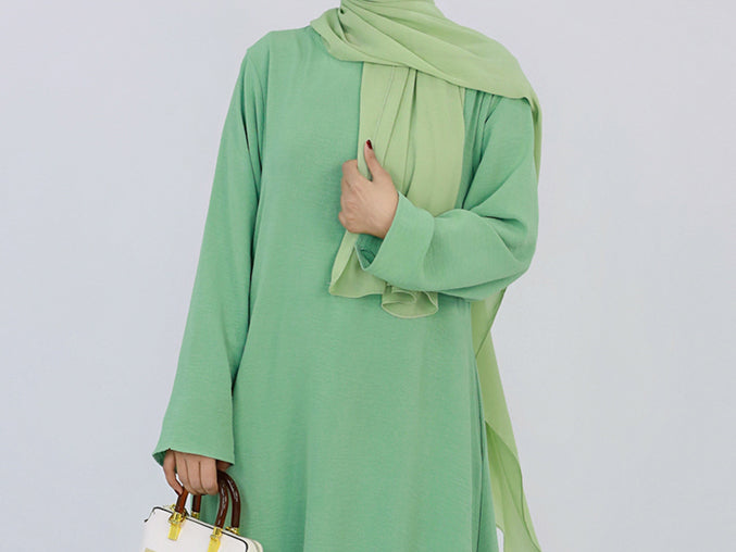 Light Green Kira loose slip dress with pockets in maxi length and with long sleeve
