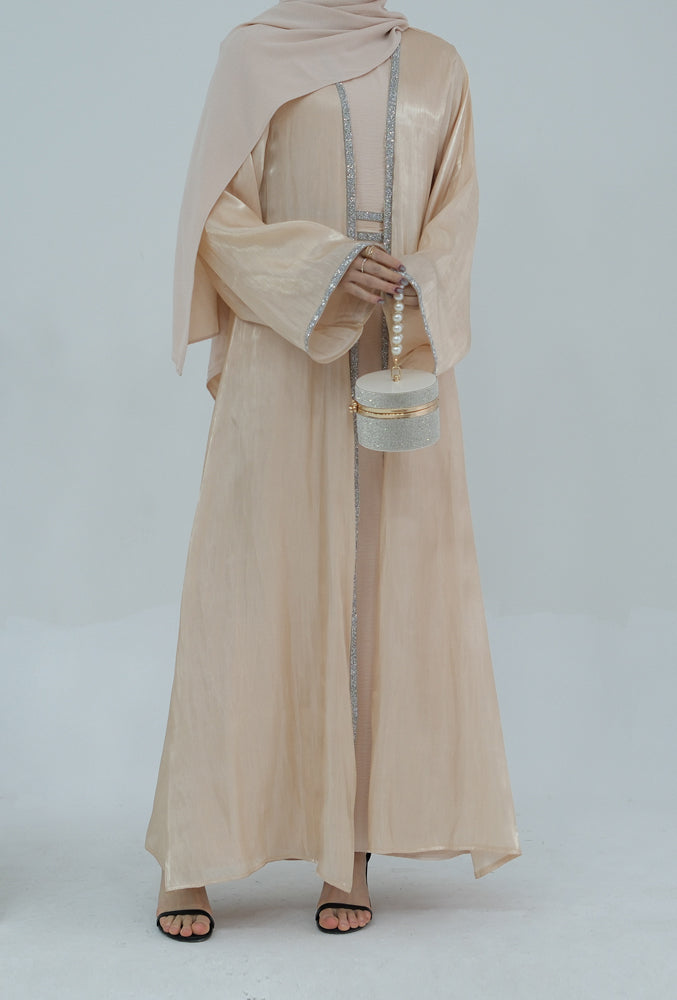 Tanju Beige abaya throw over with embroidery detailing along front hem and on sleeves with matching belt