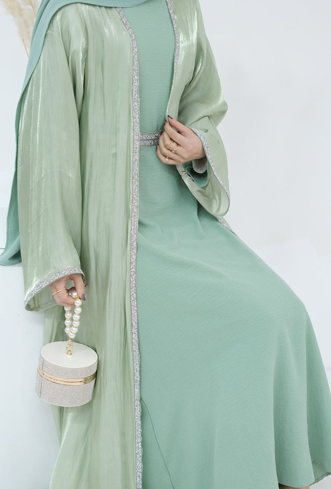 Tanju Light Green abaya throw over with embroidery detailing along front hem and on sleeves with matching belt