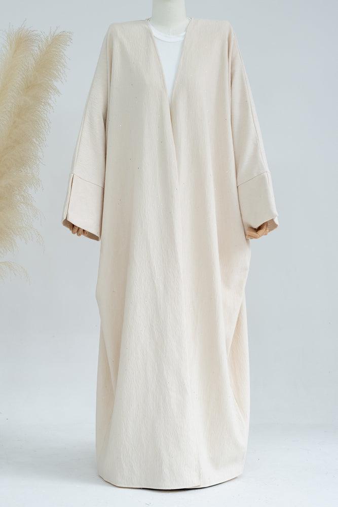 Lavish winter fall abaya throwover with sparkling fabric with batwing cut in Beige - ANNAH HARIRI