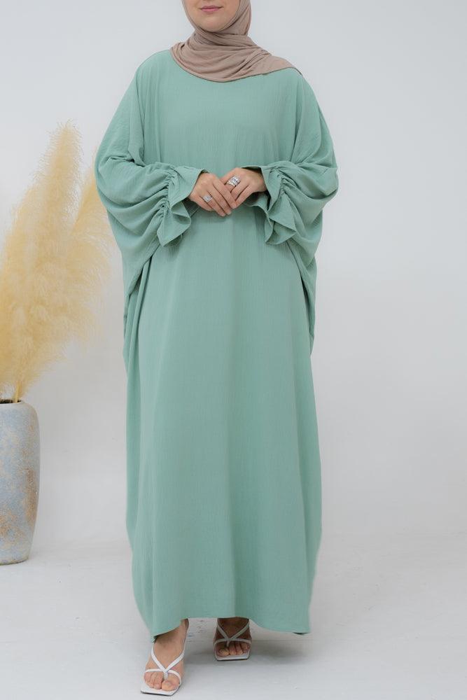 Radwa batwing abaya with ruched sleeve and loose cut in mint green - ANNAH HARIRI