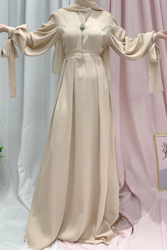 Settia maxi dress with long bow tie sleeves and belt in beige - ANNAH HARIRI