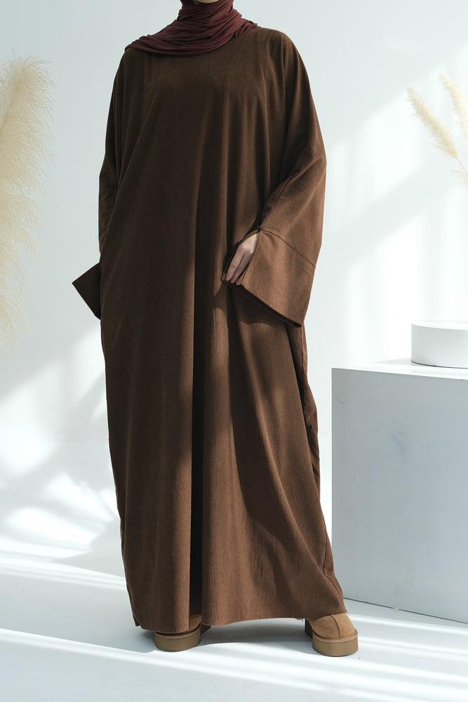 Xeniaa brown dress in velvet like fabric of a loose cut with silts on sleeve cuffs and pockets - ANNAH HARIRI
