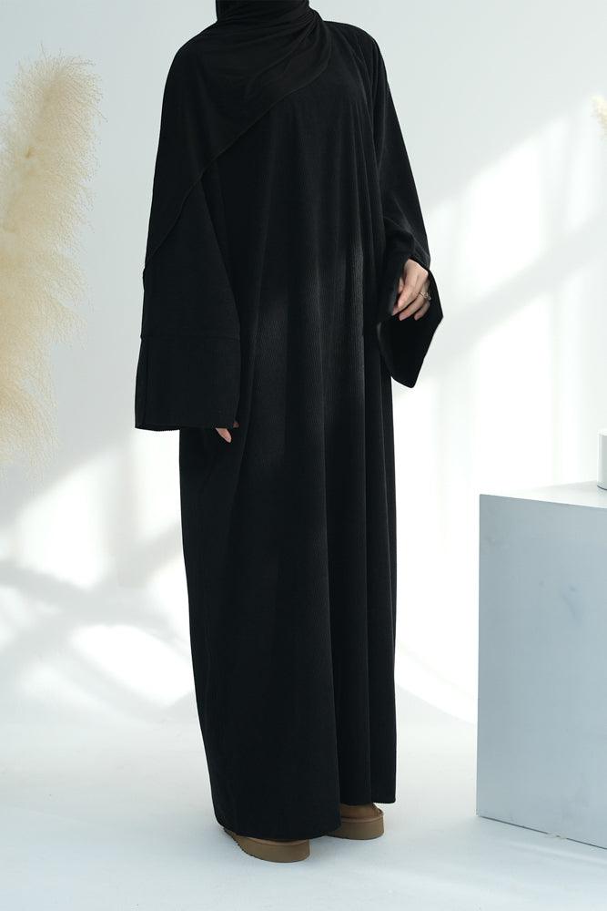 Xeniaa dress in velvet like fabric of a loose cut with silts on sleeve cuffs and pockets - ANNAH HARIRI