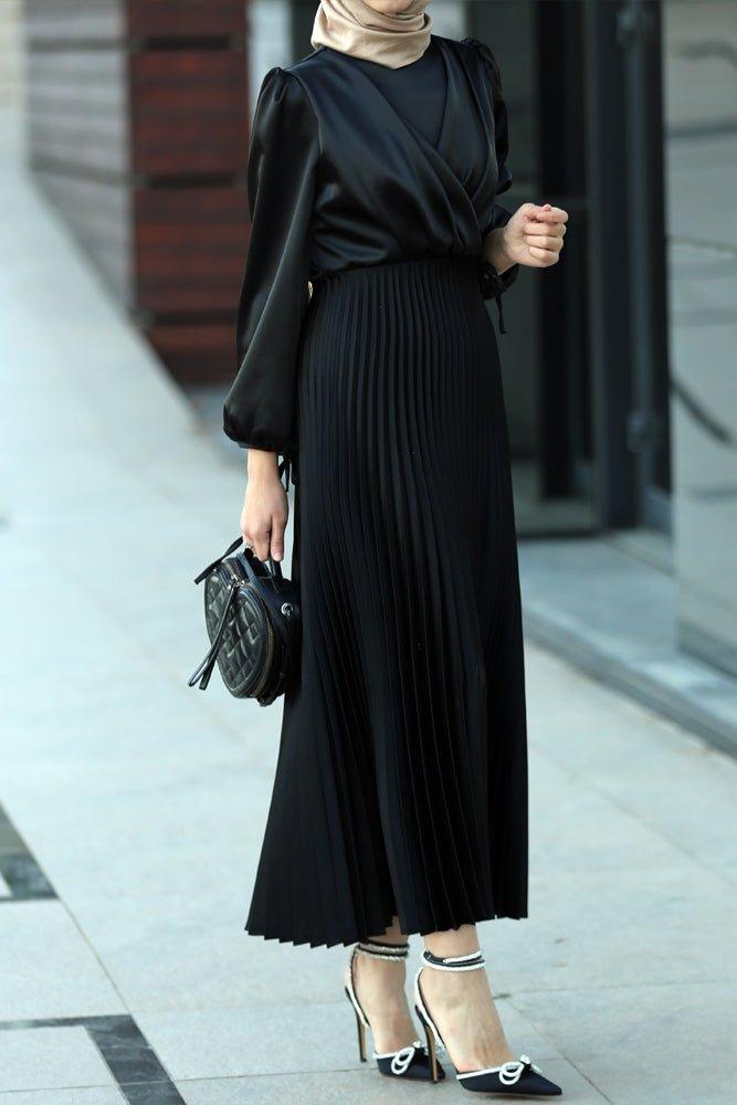 Abigal satin pleated long sleeve maxi dress with wrap waist in black - ANNAH HARIRI