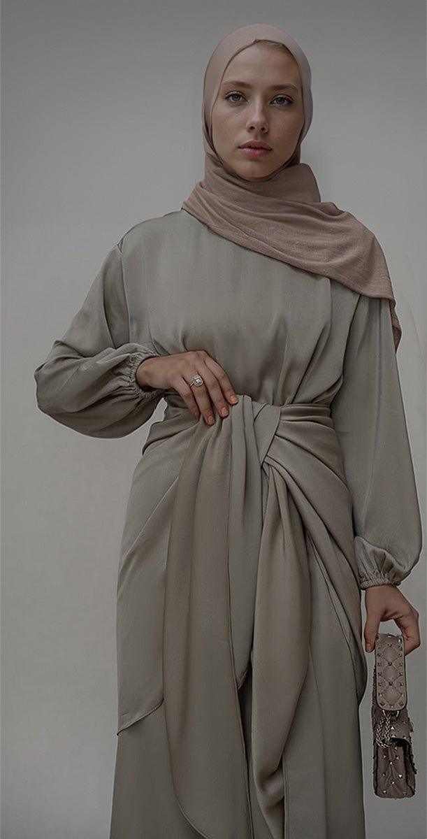 Fleeur maxi abaya dress with detached apron elasticated sleeve like tie waist piece in satin green - ANNAH HARIRI