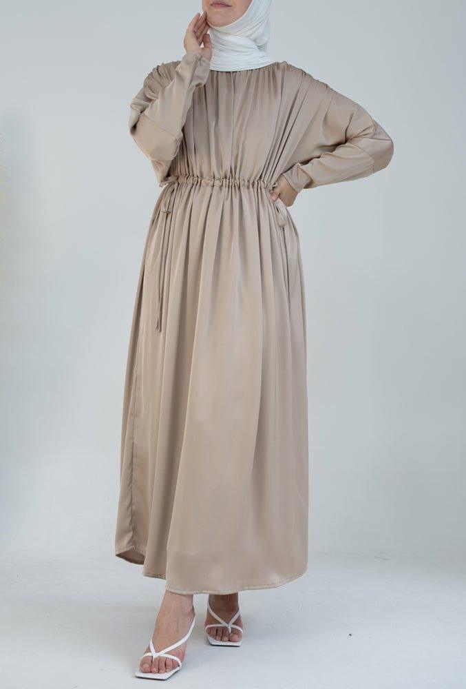 Lilita gathered batwing sleeve maxi dress with tie waist and boat neck in satin beige - ANNAH HARIRI