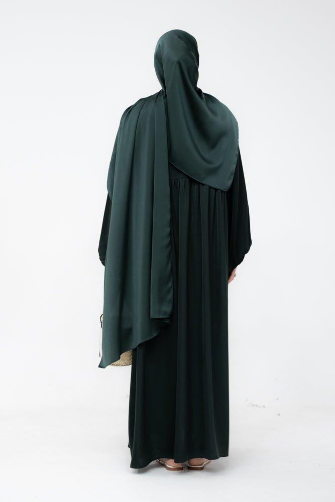 Sophie modest loose dress with pockets and elasticated wrist band in dark green - ANNAH HARIRI