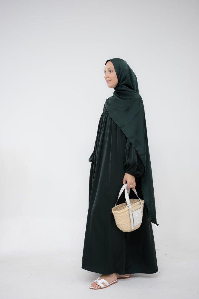 Sophie modest loose dress with pockets and elasticated wrist band in dark green - ANNAH HARIRI