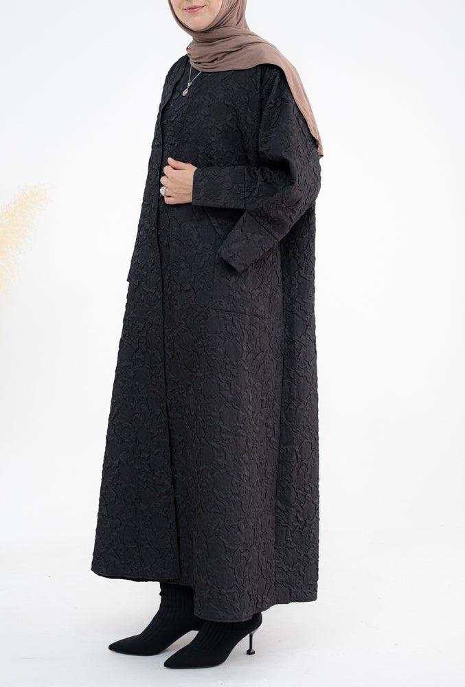 Winter Black abaya with embossed flower pattern and front pockets with a detachable belt - ANNAH HARIRI