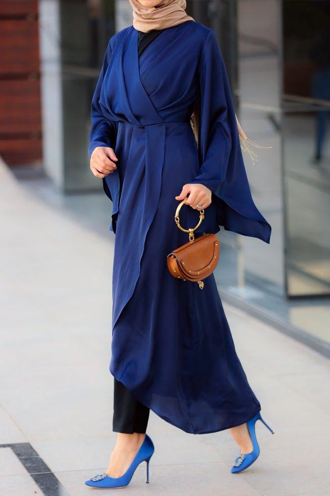 Yalla satin maxi uneven cut dress with batwing sleeve and wrap detail waist in blue - ANNAH HARIRI